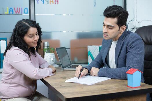 Insurance advisor explaining policy to client